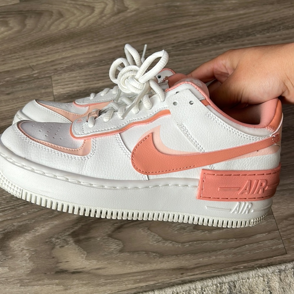 Pink and White Nike Air Force 1 women size 7